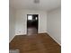 Open dining area with hardwood floors and a view into the kitchen at 1232 Memorial Se Dr, Atlanta, GA 30316