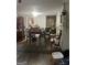 Open concept dining room with hardwood floors at 1331 Woodstone Trce, Morrow, GA 30260