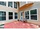 This back porch has many windows and allows for lots of natural light to enter the home at 4335 Burgomeister Pl, Snellville, GA 30039