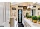 Bright bathroom featuring dual sinks, vanity, and a separate tub, creating a spa-like atmosphere at 4335 Burgomeister Pl, Snellville, GA 30039