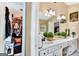 Bathroom boasts dual sinks, vanity, and a closet nearby, adding convenience at 4335 Burgomeister Pl, Snellville, GA 30039