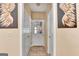 Hallway featuring tile floors and white doors to other rooms at 4335 Burgomeister Pl, Snellville, GA 30039