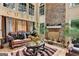 Stylish living room with stone fireplace, high ceilings and ample seating offering a comfortable place to relax at 4335 Burgomeister Pl, Snellville, GA 30039