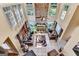 Bright living room with stone fireplace, high ceilings, and large windows, creating a spacious, inviting atmosphere at 4335 Burgomeister Pl, Snellville, GA 30039