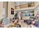 Spacious living room with a second floor balcony and open view to the kitchen at 4335 Burgomeister Pl, Snellville, GA 30039