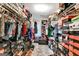 Spacious walk-in closet provides ample storage with custom shelving and hanging space for your wardrobe at 4335 Burgomeister Pl, Snellville, GA 30039
