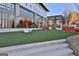 Well-maintained outdoor space for residents to enjoy, featuring lush lawn, seating, and decor at 175 Central Ave, Fayetteville, GA 30214