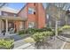 Charming home showcasing a covered porch with outdoor seating and beautiful garden at 175 Central Ave, Fayetteville, GA 30214