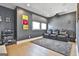 Home theater featuring comfortable seating, a projector, and dark walls for an immersive experience at 175 Central Ave, Fayetteville, GA 30214