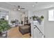 Cozy living room with hardwood floors, comfortable seating, and lots of natural light from large windows at 175 Central Ave, Fayetteville, GA 30214