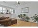 Bright living room with natural light, hardwood floors, and a cozy seating area, perfect for relaxation at 175 Central Ave, Fayetteville, GA 30214