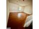 Spacious living area showcasing hardwood floors and a staircase at 5730 Koweta Rd, South Fulton, GA 30349
