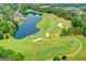 Expansive aerial of golf course and lake at 10125 Brixton Pl, Suwanee, GA 30024