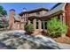 Backyard featuring brick detail and patio at 10125 Brixton Pl, Suwanee, GA 30024