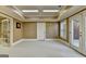 Spacious bonus room featuring recessed lighting, carpeting, and outdoor access at 10125 Brixton Pl, Suwanee, GA 30024