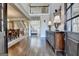 Grand foyer showcasing soaring ceilings, hardwood floors, and elegant staircase at 10125 Brixton Pl, Suwanee, GA 30024