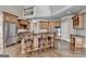 Kitchen with a large island, hardwood floors, stainless steel appliances and second-story view at 10125 Brixton Pl, Suwanee, GA 30024