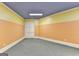 Spacious bonus room featuring ample closet space and neutral carpet at 10125 Brixton Pl, Suwanee, GA 30024