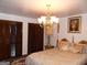 Bedroom featuring plush bedding, soft lighting, and decorative details at 4213 Janice Drive, Atlanta, GA 30337