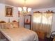 Bedroom featuring plush bedding, soft lighting, and decorative details for a cozy ambiance at 4213 Janice Drive, Atlanta, GA 30337