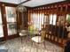 Cozy dining area featuring an ornate glass table, seating for four, and natural light at 4213 Janice Drive, Atlanta, GA 30337