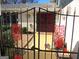 Enchanting gated entrance adorned with lush greenery creates a welcoming ambiance at 4213 Janice Drive, Atlanta, GA 30337
