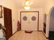 Grand entryway featuring double doors, tile flooring, and a decorative chandelier at 4213 Janice Drive, Atlanta, GA 30337