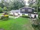 Inviting front yard features vibrant landscaping, lush green lawn, and a charming facade at 4213 Janice Drive, Atlanta, GA 30337