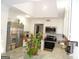 Modern kitchen with stainless steel appliances, granite countertops, and ample cabinet space for storage at 4213 Janice Drive, Atlanta, GA 30337