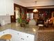 Charming kitchen with a granite countertop, adjacent to the dining area at 4213 Janice Drive, Atlanta, GA 30337