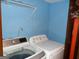 Functional laundry area with modern washer and dryer units, designed for convenience at 4213 Janice Drive, Atlanta, GA 30337