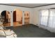 Inviting living room with archways and large window providing natural light, creating a warm and welcoming atmosphere at 4213 Janice Drive, Atlanta, GA 30337