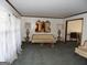 Elegant living room featuring neutral tones, decorative mirrors, and ample space for entertaining guests at 4213 Janice Drive, Atlanta, GA 30337