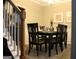 Comfortable dining area with seating for eight and ample room for entertaining at 419 Tea Rose N Ln, Stockbridge, GA 30281