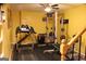 Well-equipped home gym with treadmill and weightlifting equipment for fitness enthusiasts at 419 Tea Rose N Ln, Stockbridge, GA 30281