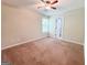 Comfortable bedroom with a ceiling fan, carpet, and a window view at 33 Corinth Rd, Cartersville, GA 30121