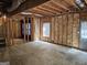 Unfinished basement featuring exposed framing, ductwork, and insulation at 6281 Vinings Vintage Dr, Mableton, GA 30126