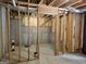 Unfinished basement space with exposed framing, insulation, and concrete walls, offering customization potential at 6281 Vinings Vintage Dr, Mableton, GA 30126