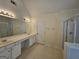 Bathroom featuring double sinks, and a standing shower at 6281 Vinings Vintage Dr, Mableton, GA 30126