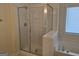 Bathroom featuring a glass shower and a tub at 6281 Vinings Vintage Dr, Mableton, GA 30126