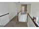 The hallway features neutral walls and a view of the staircase, creating a bright, open space at 6281 Vinings Vintage Dr, Mableton, GA 30126