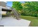 Home featuring a deck, patio and stairs leading to the backyard at 6281 Vinings Vintage Dr, Mableton, GA 30126