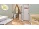 Bright and airy bathroom with a tub and vessel sink at 310 Hamdon Kells, Peachtree City, GA 30269