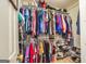 Walk-in closet with built-in shelves and plenty of storage space at 310 Hamdon Kells, Peachtree City, GA 30269