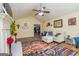 Bright living room with cozy furniture, fireplace, and hardwood floors at 310 Hamdon Kells, Peachtree City, GA 30269