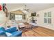 Inviting living room with vaulted ceilings, fireplace, and custom built-in shelving at 310 Hamdon Kells, Peachtree City, GA 30269