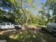 View of the wooded backyard at 4582 Hendrix Dr, Forest Park, GA 30297