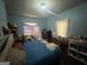 View of a bedroom with a bed, and natural light at 4582 Hendrix Dr, Forest Park, GA 30297