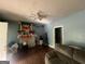 Living room with a fireplace and a decorated tree, with furniture at 4582 Hendrix Dr, Forest Park, GA 30297
