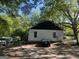Rear view of a one-story home with a dark-colored roof at 4582 Hendrix Dr, Forest Park, GA 30297